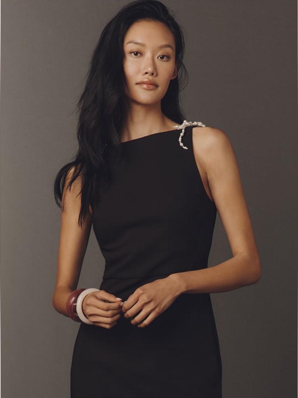 En Saison Black Sleeveless Mini Dress with Pearl Bow Shoulder Embellishments